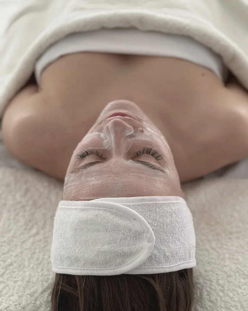 Client receiving a restorative facial